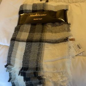 I have a Blanket Scarf,  nice to wear with your coat, the scarf is very soft!!!